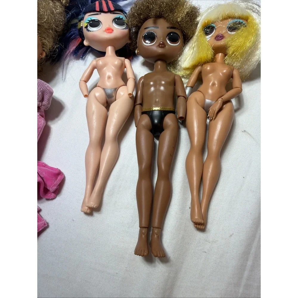 Lot Of 4 L.O.L. Surprise Dolls 3 Females And 1 Male